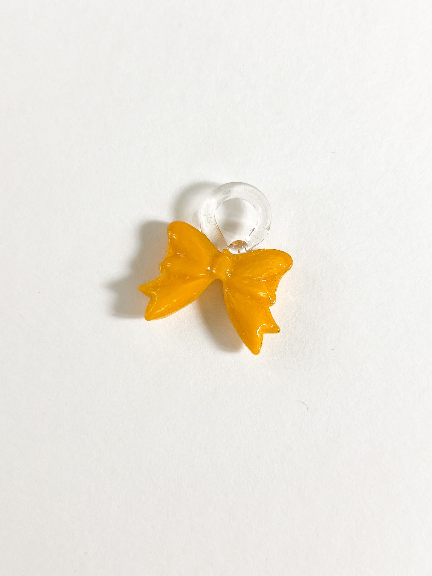 Bonbon Earrings — Bow ୨୧